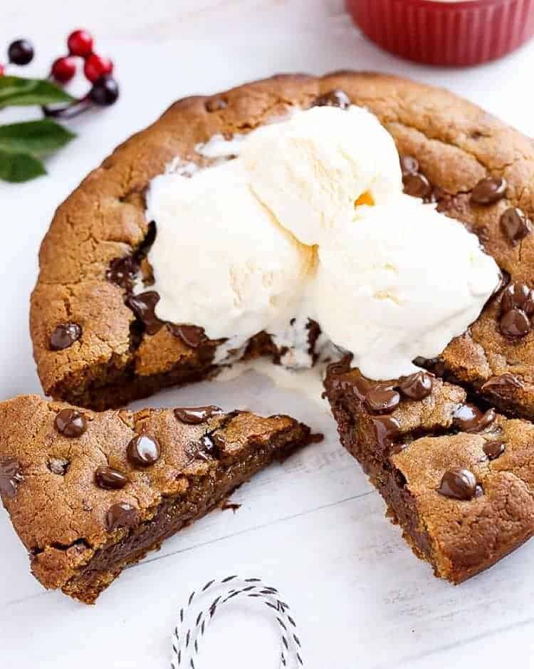 Nutella Stuffed Browned Butter Gingerbread Skillet Cookie | https://cafedelites.com