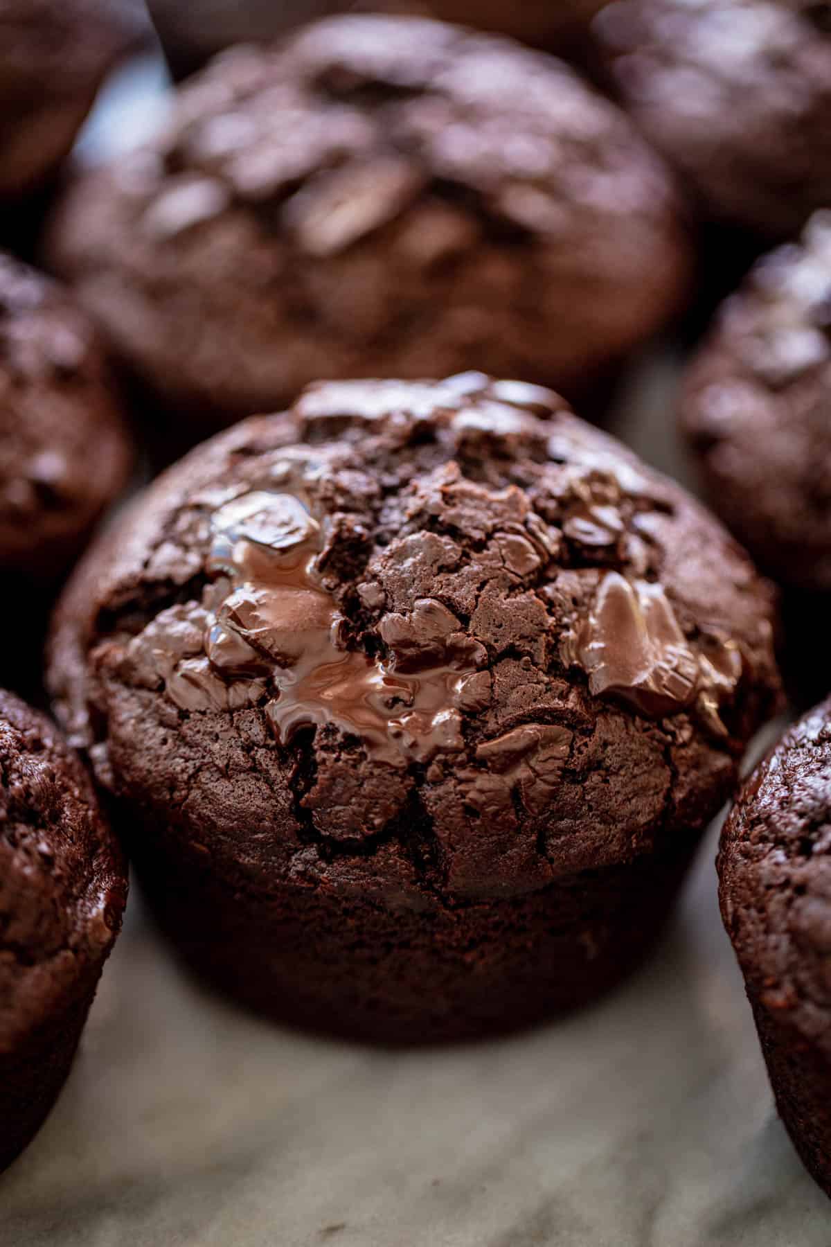 side view of chocolate muffin on a marble table