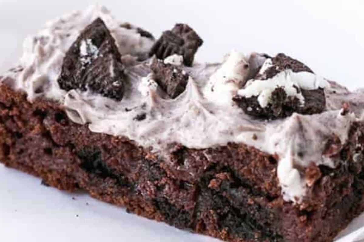 Let brownies cool for 5 minutes, spread the frosting over the top, and add extra crushed cookies  - 10