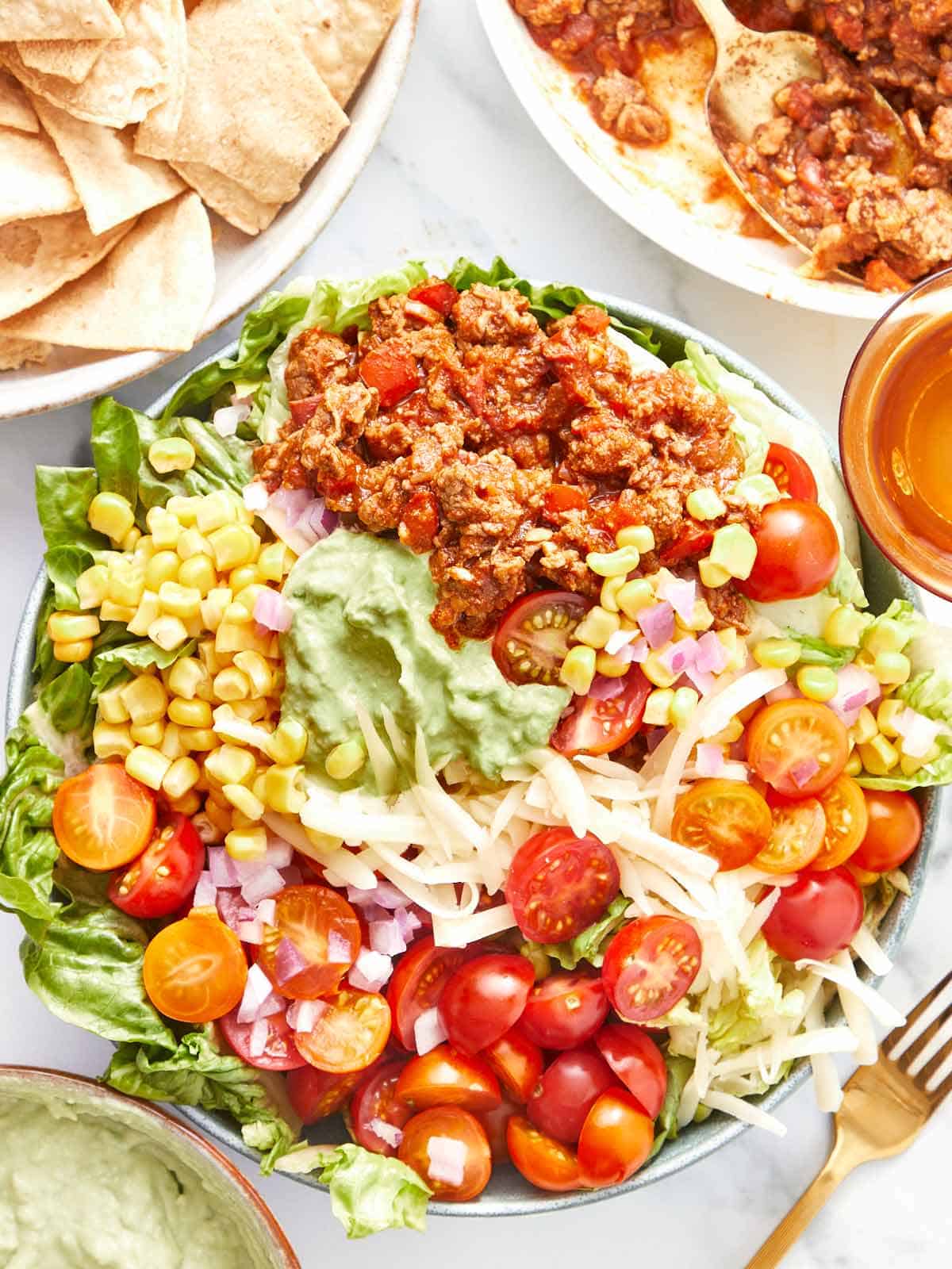 Close up image finished taco salad. 