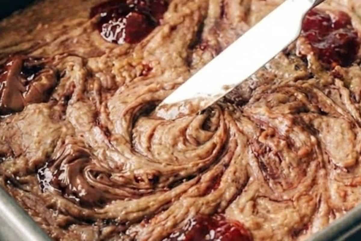  Use a knife to gently swirl the spreads through the batter - 7