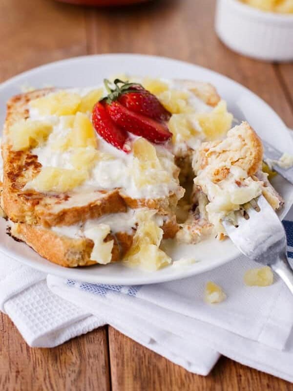 Piña Colada French Toast on a plate with fork