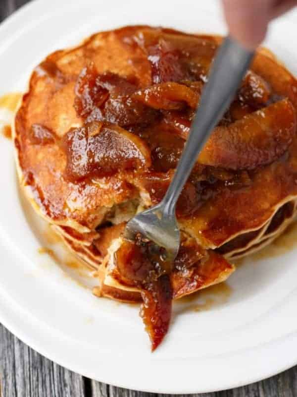 Juicy soft apple pieces enwrapped in vanilla and cinnamon fluffy pancakes Caramel Apple Pancakes