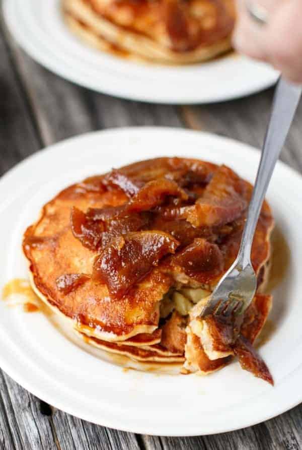 Juicy soft apple pieces enwrapped in vanilla and cinnamon fluffy pancakes Caramel Apple Pancakes