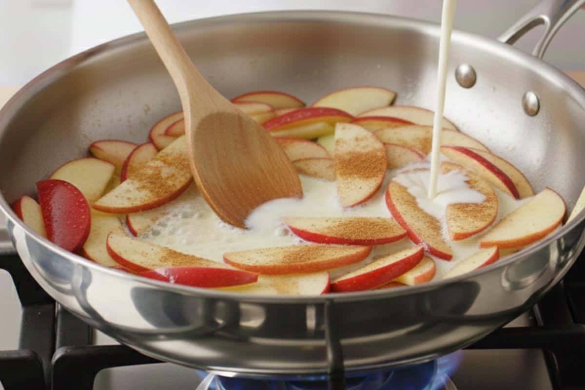 Pouring the milk in the pan. - 8