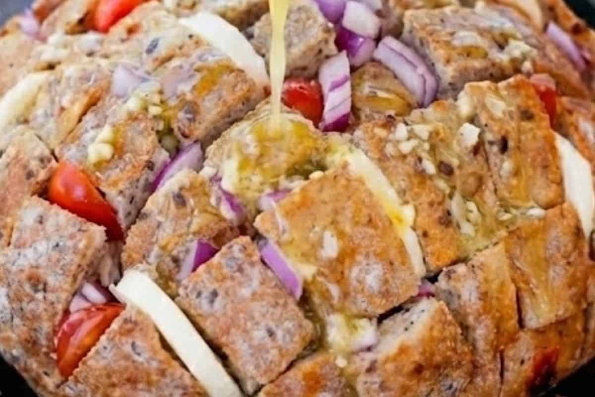 Drizzle melted garlic butter or garlic infused olive oil generously into each cut