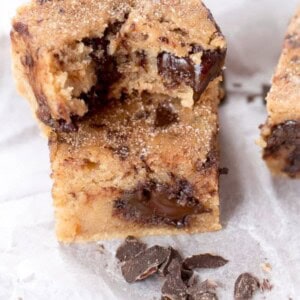 Churro Chocolate Chunk Blondies pieces on butter paper