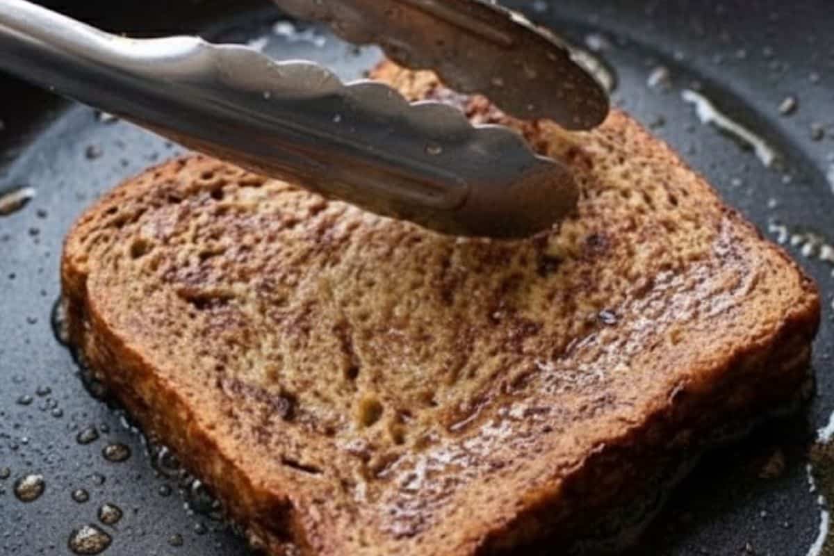 Heat a nonstick pan with a coating of oil spray and cook each slice over medium until both sides are golden - 5