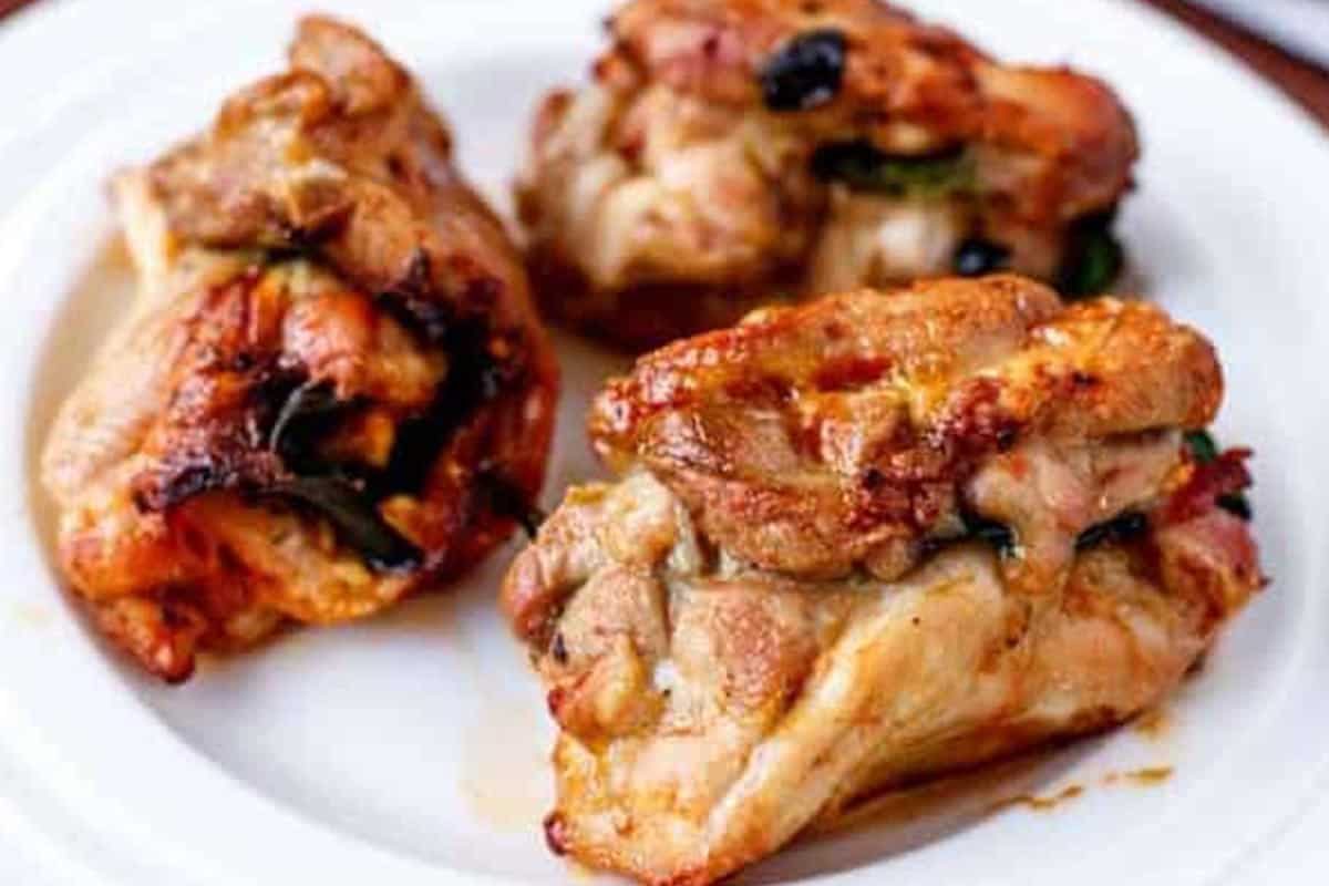 Close-up shot of Feta, Bacon and Sundried Tomato Stuffed Chicken Rolls. - 10