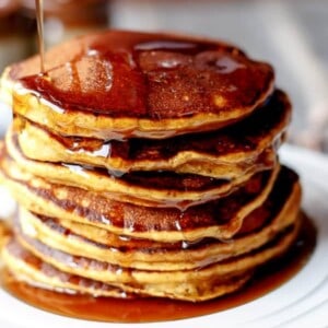 Caramel Chip Pumpkin Pancakes stack on each other