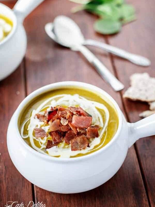 Creamy Pumpkin and Spinach Soup with Crispy Bacon in a bowl