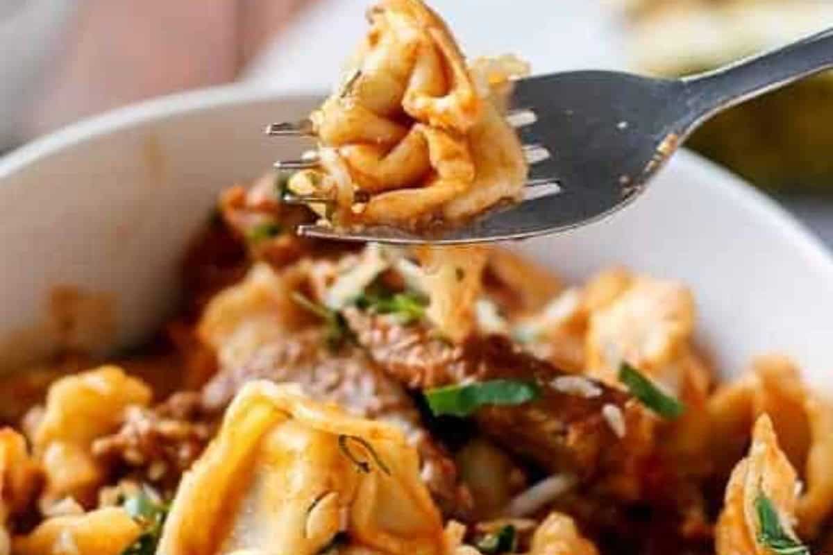 Transfer to bowls and sprinkle with parmesan and the remaining parsley