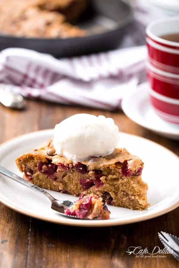 A beautifully textured cake spiked with just the right amount of bourbon and sweetened wit Boozy Cranberry Cobbler Cake