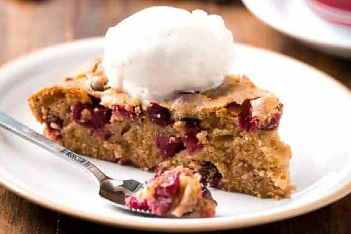Close-up shot of Boozy Cranberry Cobbler Cake. - 8