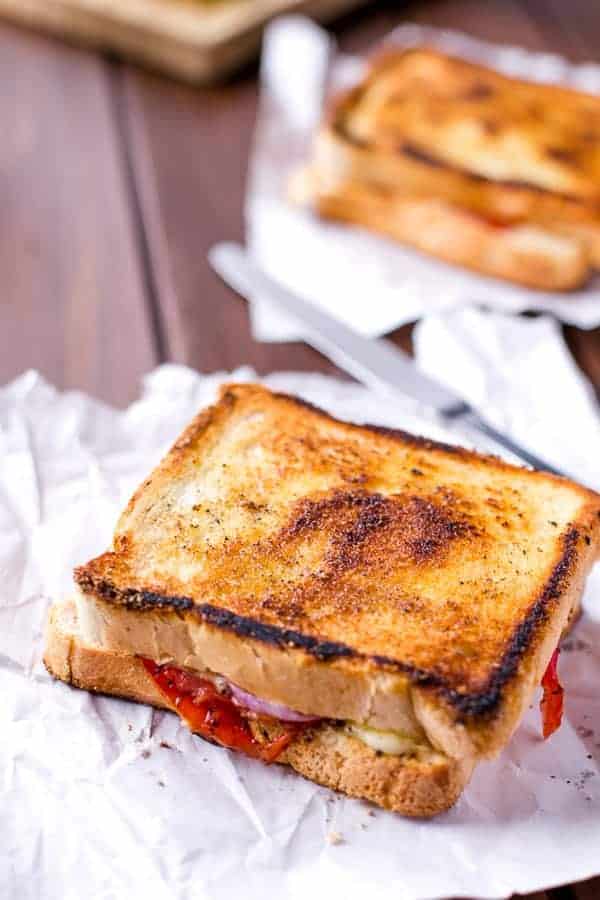 You know those salads that always stick around in your head and you can never get them out Caprese Grilled Cheese