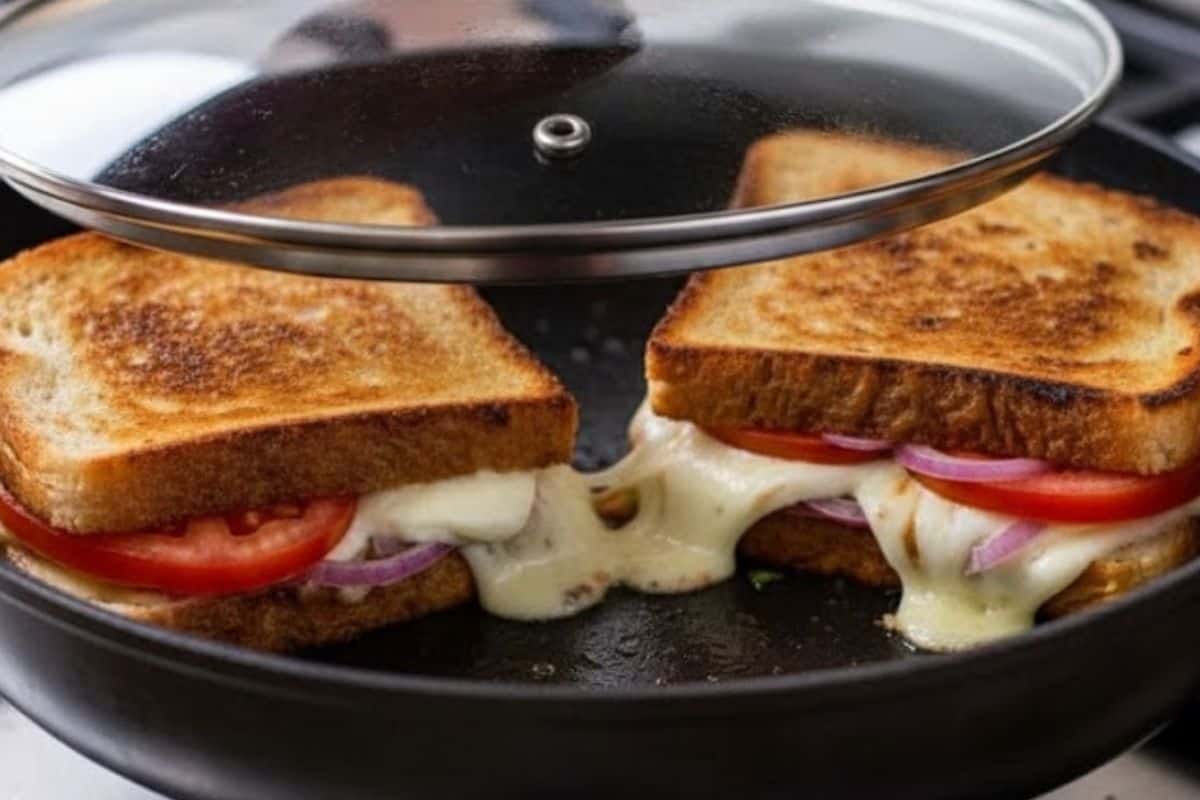 Place the sandwiches in the pan and cook until both sides turn golden and the cheese melts