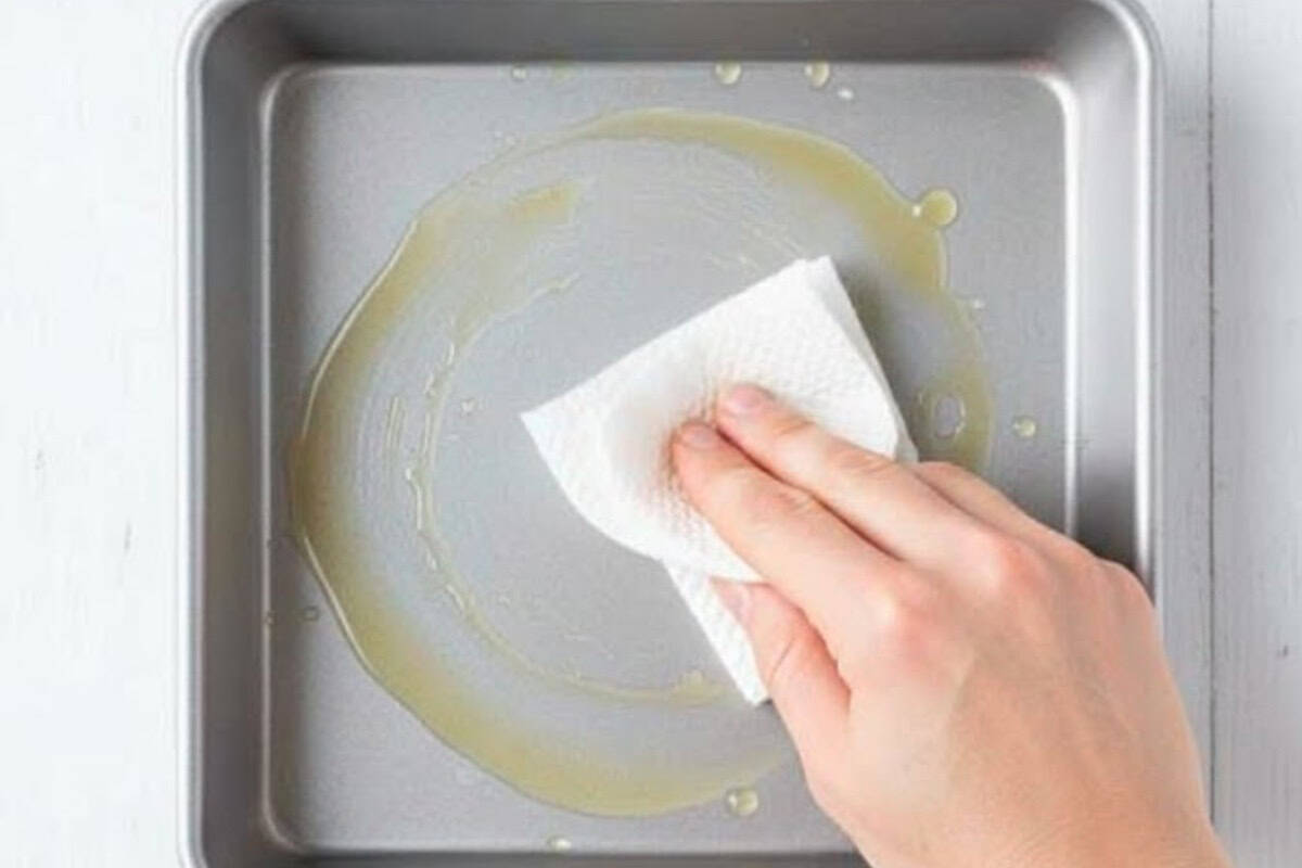 Set oven to 180C or 350F and grease an 8 by 8 inch pan with cooking spray, wiping away excess with a paper towel. - 3