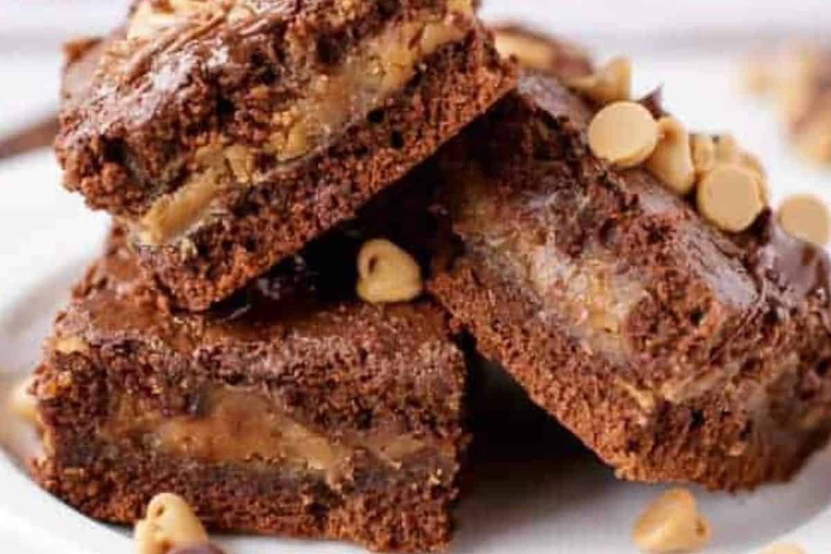 Sprinkle chocolate chips and Reese’s chips over the warm brownies - 10