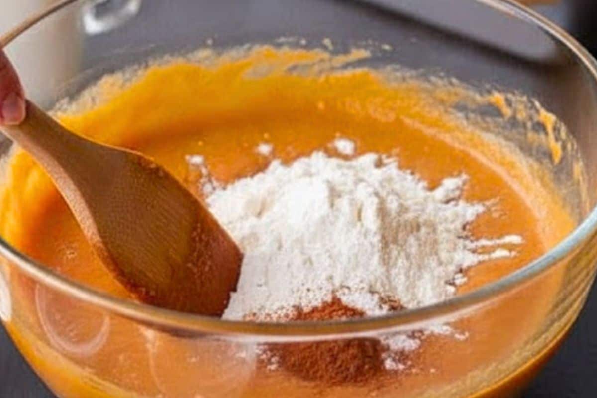 Stir in the flour, baking powder, cinnamon, and salt until just combined. 