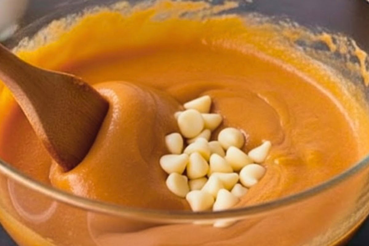 Gently mix in the white chocolate chips to add extra sweetness and texture to the batter.