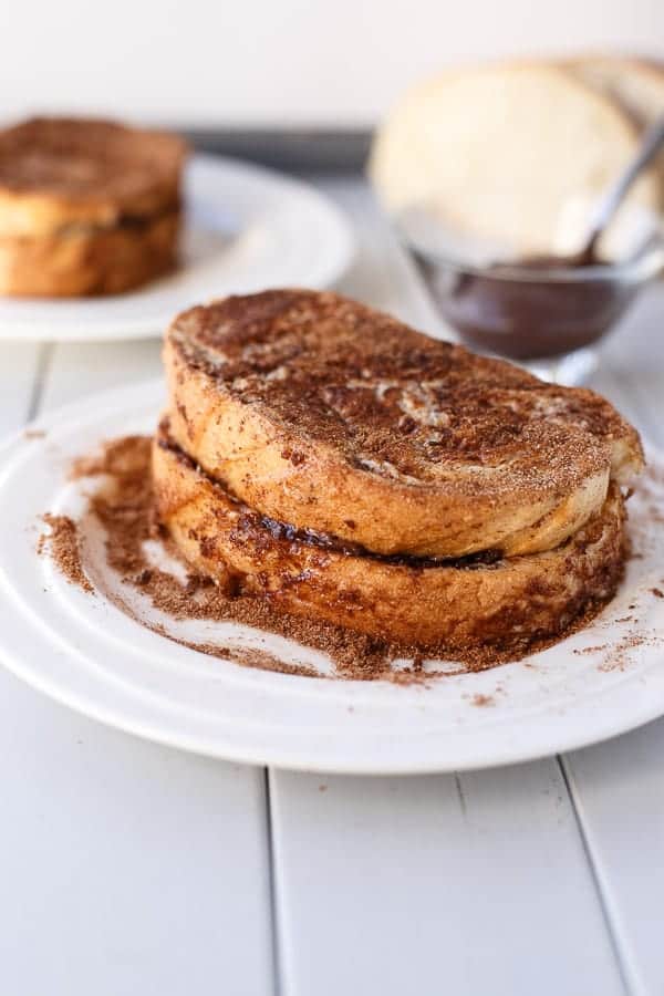  coated in Cinnamon Sugar and FULL of CHURRO flavour Nutella Stuffed Churro French Toast