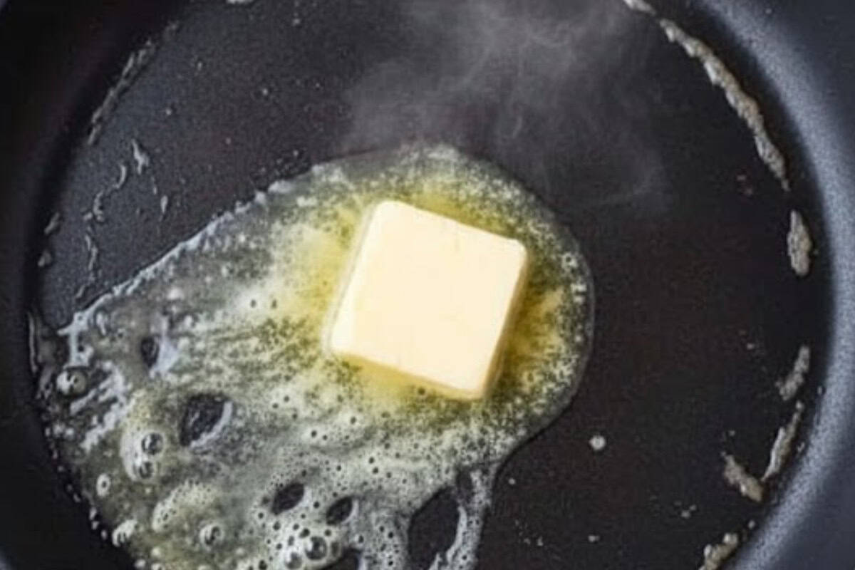 Warm a nonstick skillet with a little butter over medium heat.