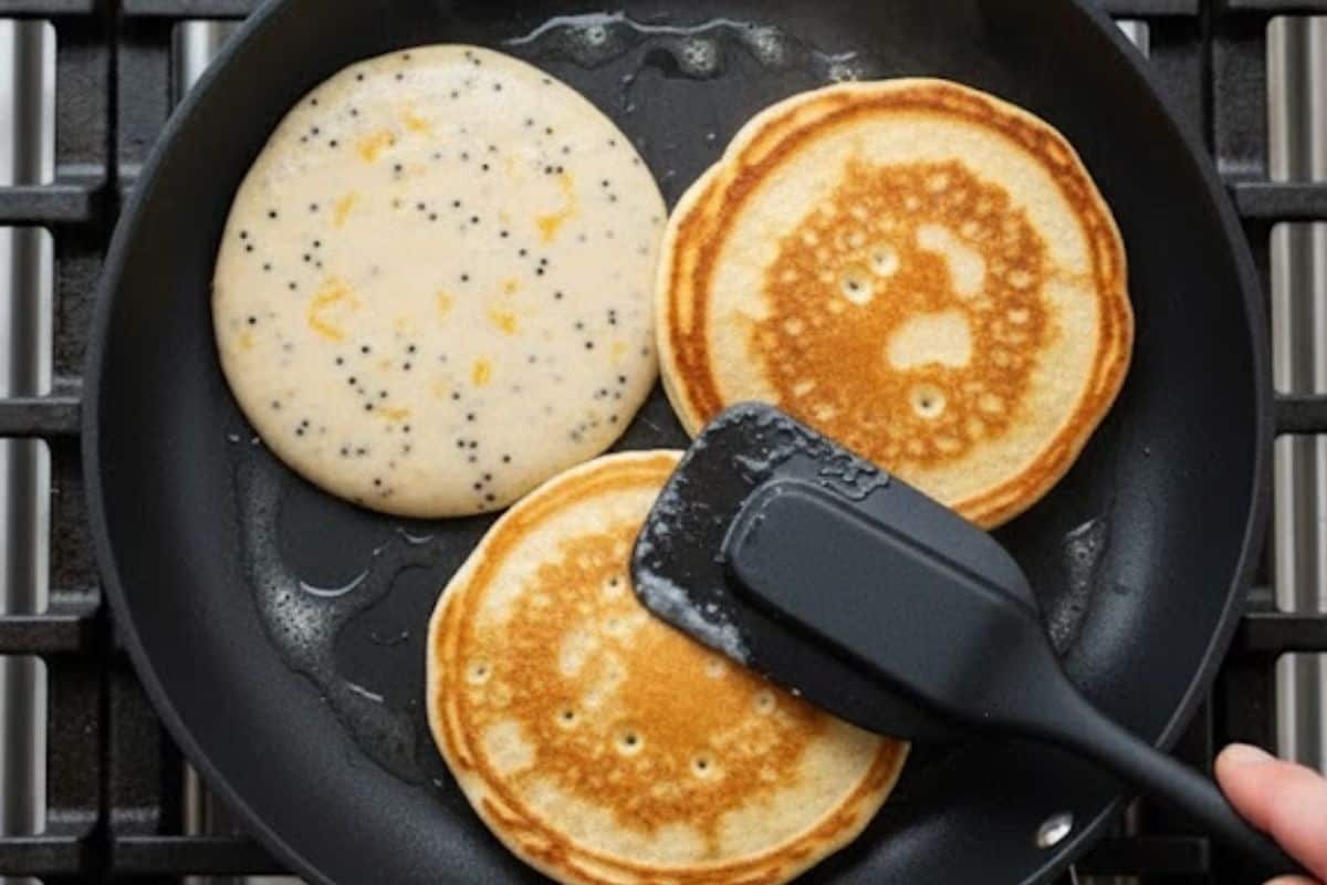 Scoop about one quarter cup of batter onto the pan, cook until golden. - 9