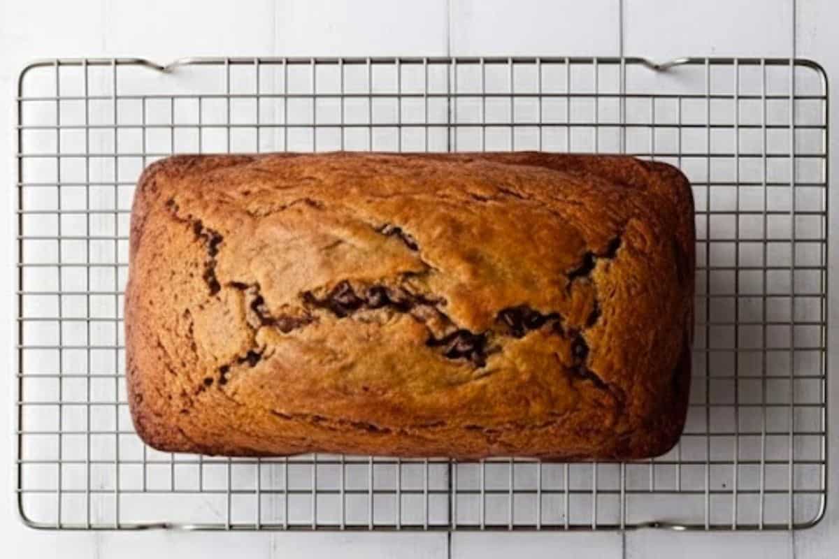 Pour the batter into the prepared pan and bake for 55 to 60 minutes or until the top feels firm and a toothpick comes out clean - 7