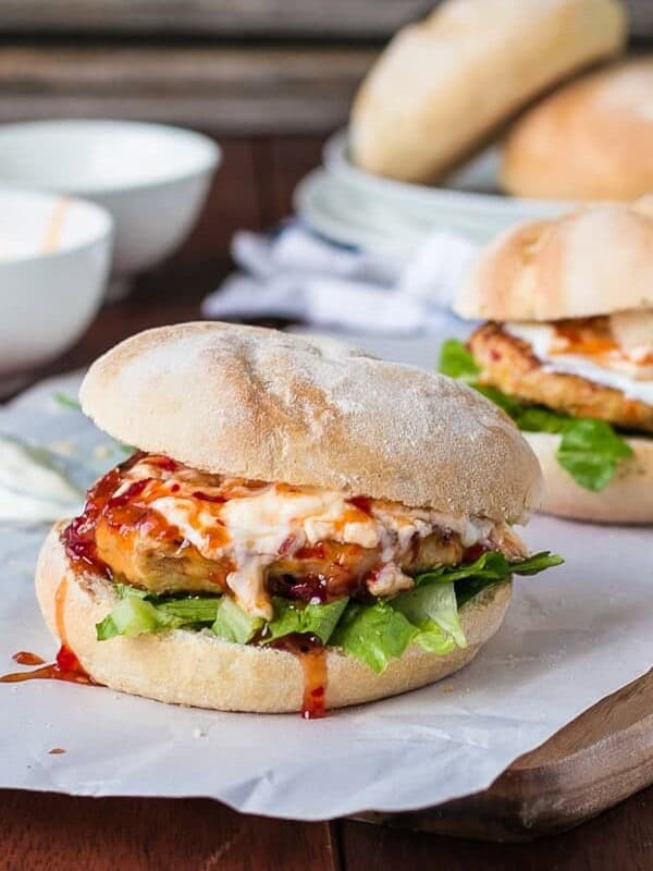 Sour Cream and Sweet Chilli Chicken Burgers on butter paper