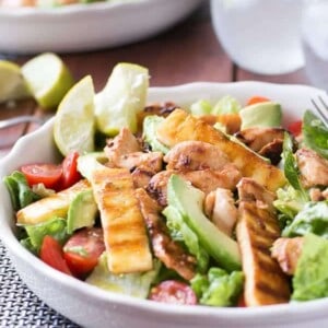Chicken, Haloumi and Avocado Salad with Lime Dressing in a bowl