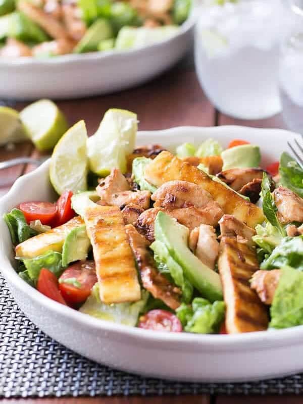 Sweet Chilli Chicken, Haloumi and Avocado Salad with Lime Dressing in a bowl