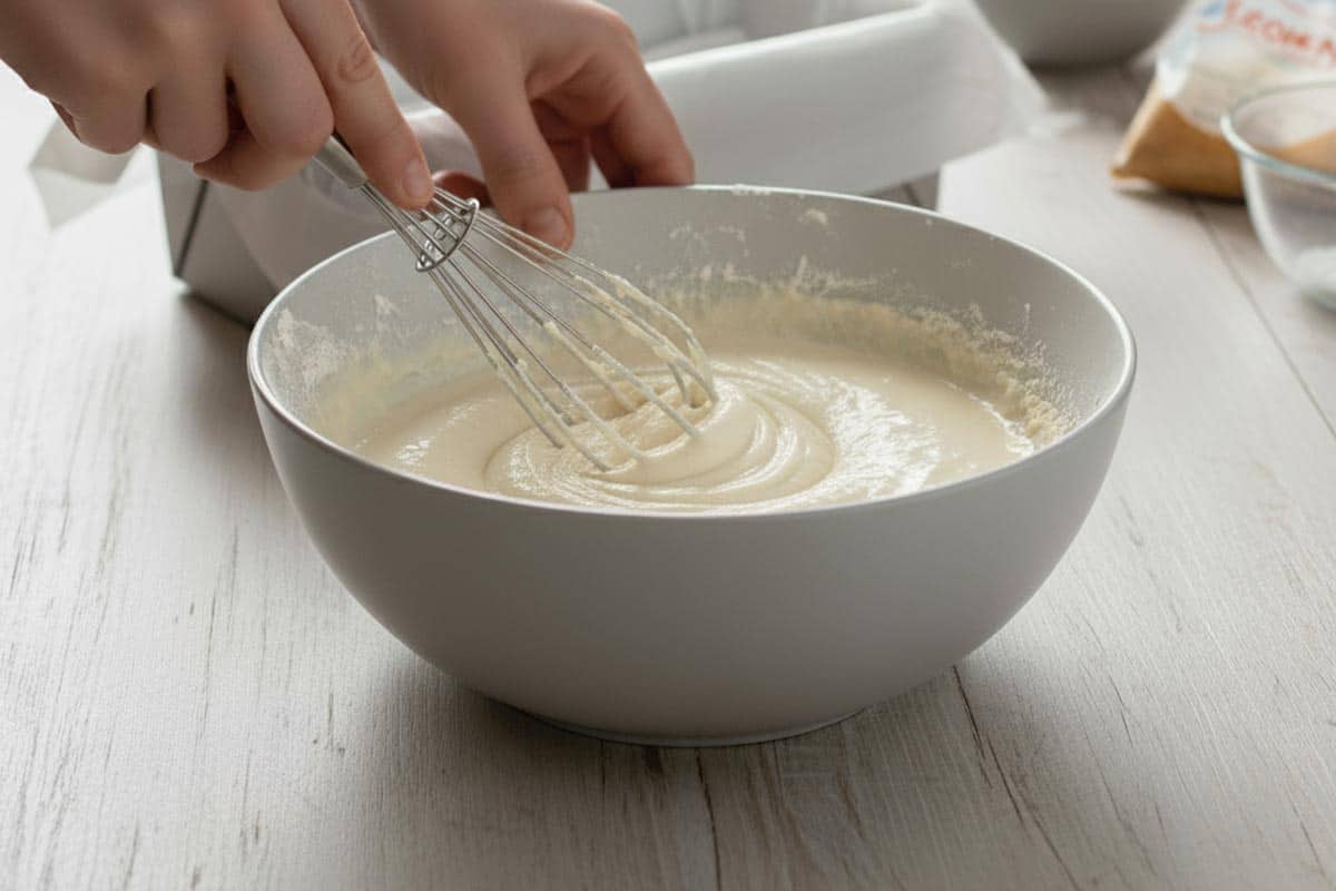 Stirring the ingredients together.