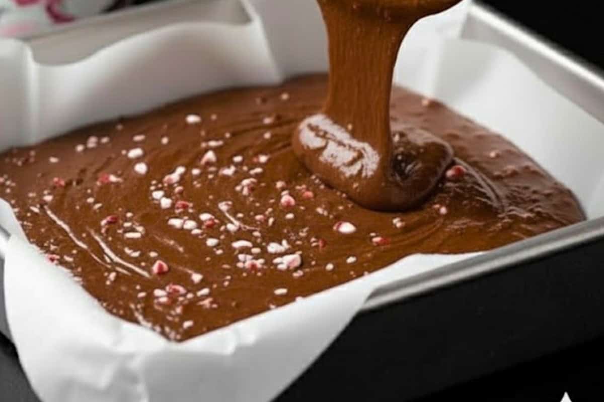 Pour the batter into the prepared pan, smoothing out the top