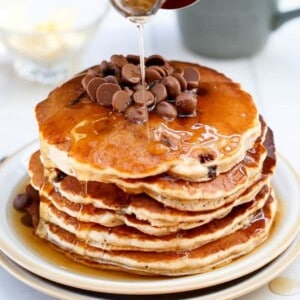Whole Wheat Choc Chip Banana Bread Pancakes stack on each other on a plate