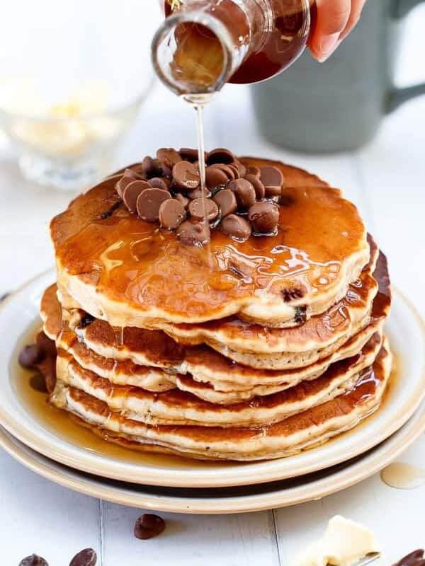 Whole Wheat Choc Chip Banana Bread Pancakes stack on each other on a plate