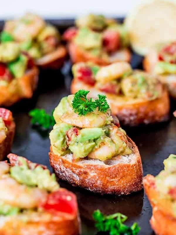 Garlic Prawn and Avocado Crostini on a tray