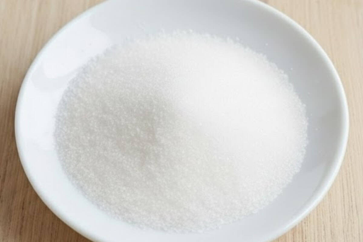 Spread the sugar or cinnamon sugar onto a small plate for coating. - 9