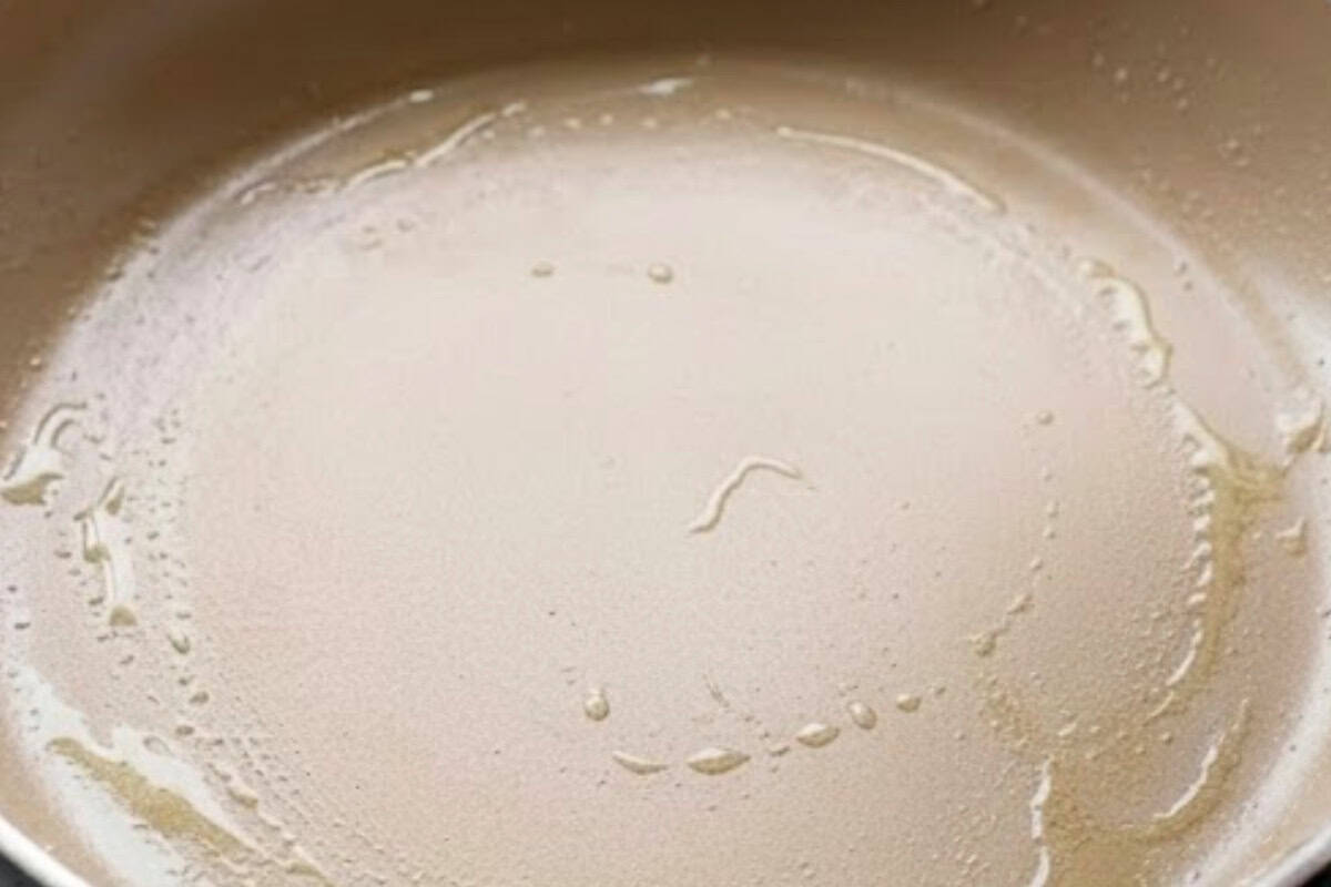 Lightly grease a nonstick pan with butter