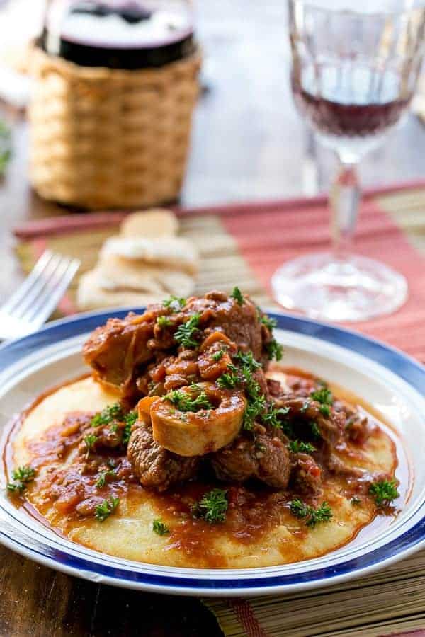 Osso Bucco in Red Wine Salsa with Soft Polenta | https://cafedelites.com
