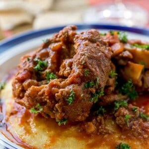 Osso Bucco in Red Wine Salsa with Soft Polenta on a plate