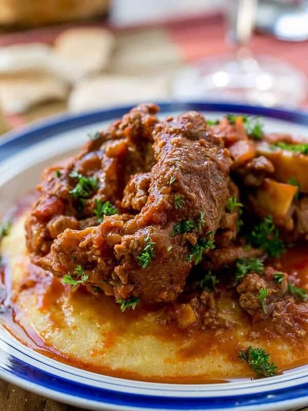 Osso Bucco in Red Wine Salsa with Soft Polenta on a plate