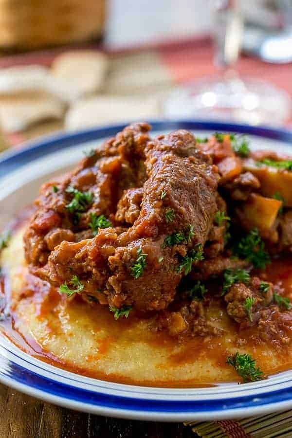 Osso Bucco in Red Wine Salsa with Soft Polenta | https://cafedelites.com