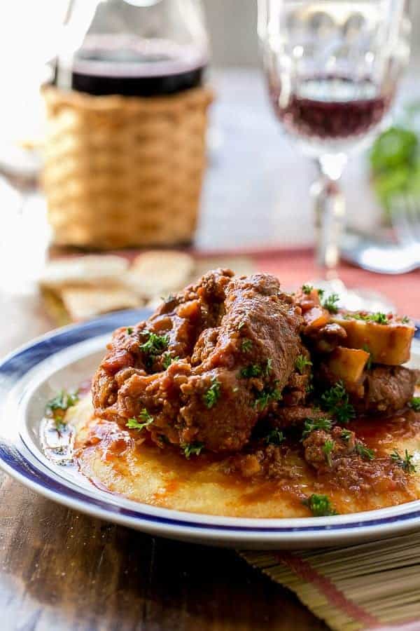 Osso Bucco in Red Wine Salsa with Soft Polenta | https://cafedelites.com