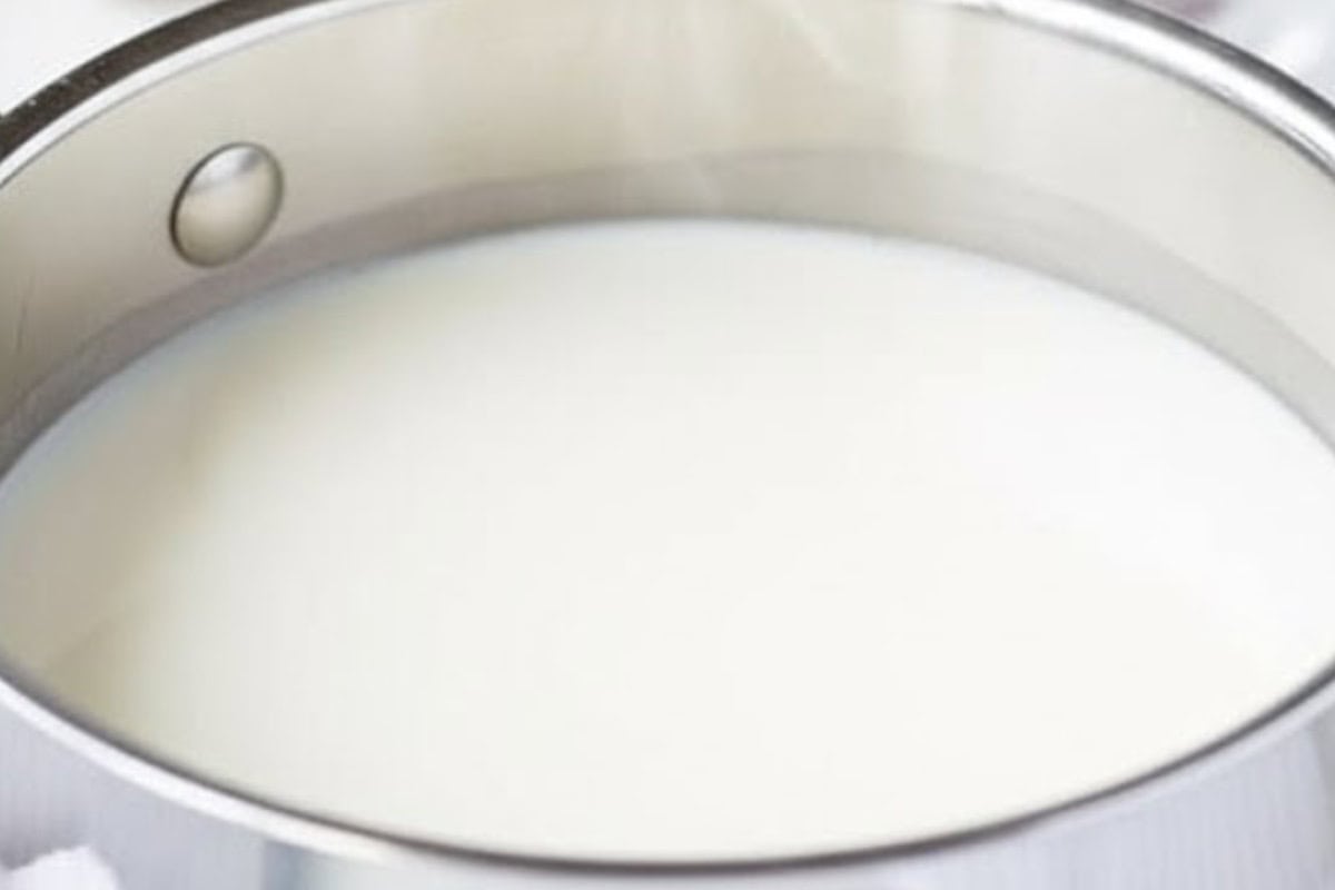 Warm the milk in a medium sauce pan over medium high heat.