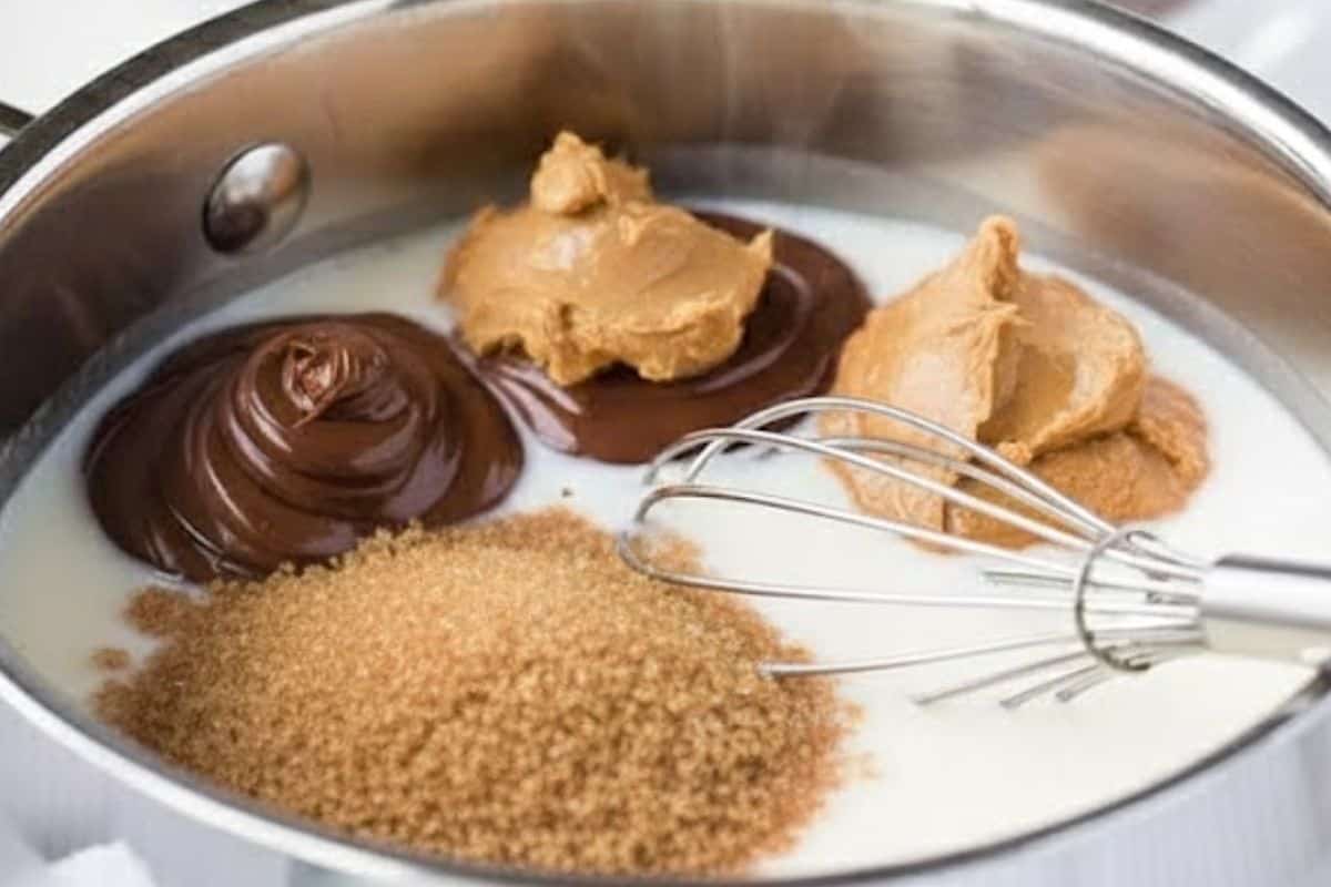 Add Nutella, peanut butter, cocoa powder, and sugar.