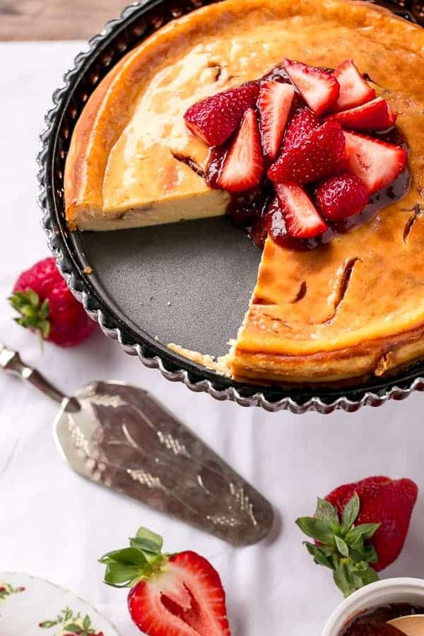 Strawberry Swirl Cheesecake https://cafedelites.com