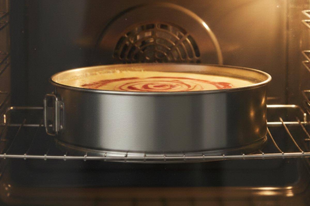 Baking the cheesecake in the oven.