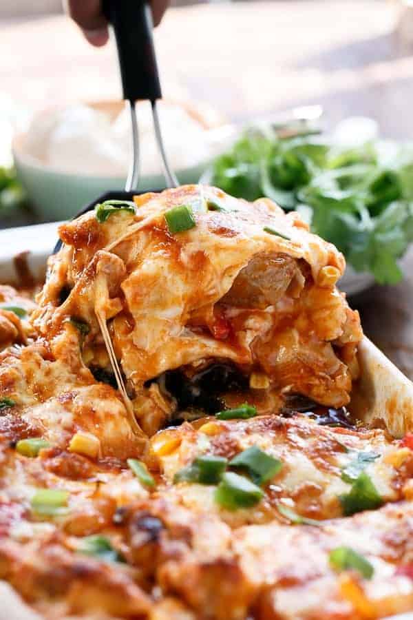 A cheesy and warm dish full of comfort food Chicken and Corn Enchilada Bake