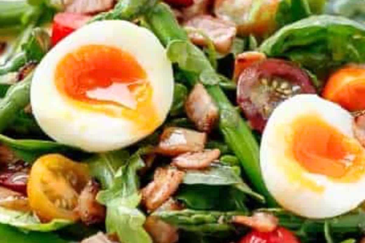 Add the crisp bacon and soft boiled eggs on top, then drizzle with the honey mustard dressing. - 8