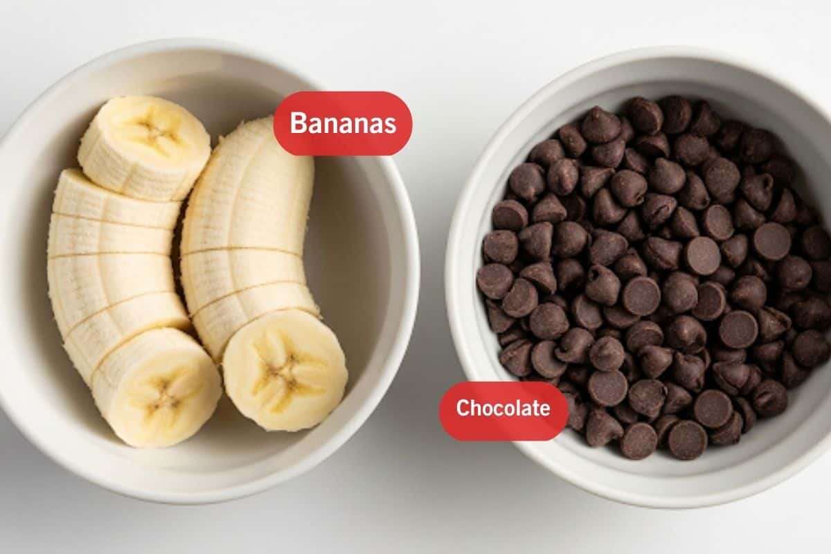 Flat lay photo of ingredient shot of sliced bananas and chocolate of choice.